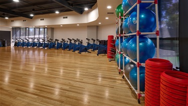 The room is for dance, yoga, Pilates, and small group training.
