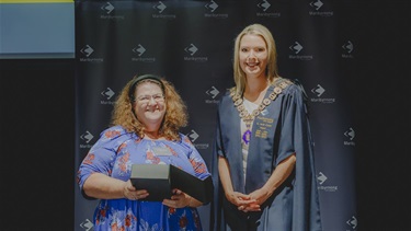 Mayor Cr Sarah Carter presenting the 2023 Mayoral Award to Dr Kitty Scot on behalf of Flood Warriors.