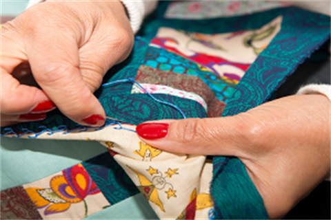 sewing volunteer-w.png