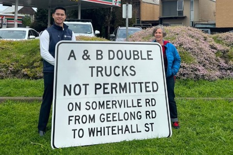 Mayor Anthony Tran and Councilor Bernadette Thomas standing next to a truck advisory sign that reads A & B double trucks not permitted on Somerville rd from Geelong Rd to Whitehall st