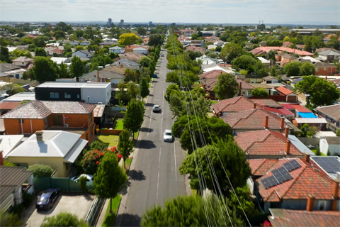 Image of tree lined residential street from above