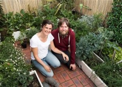 Image of a productive garden and two renteres